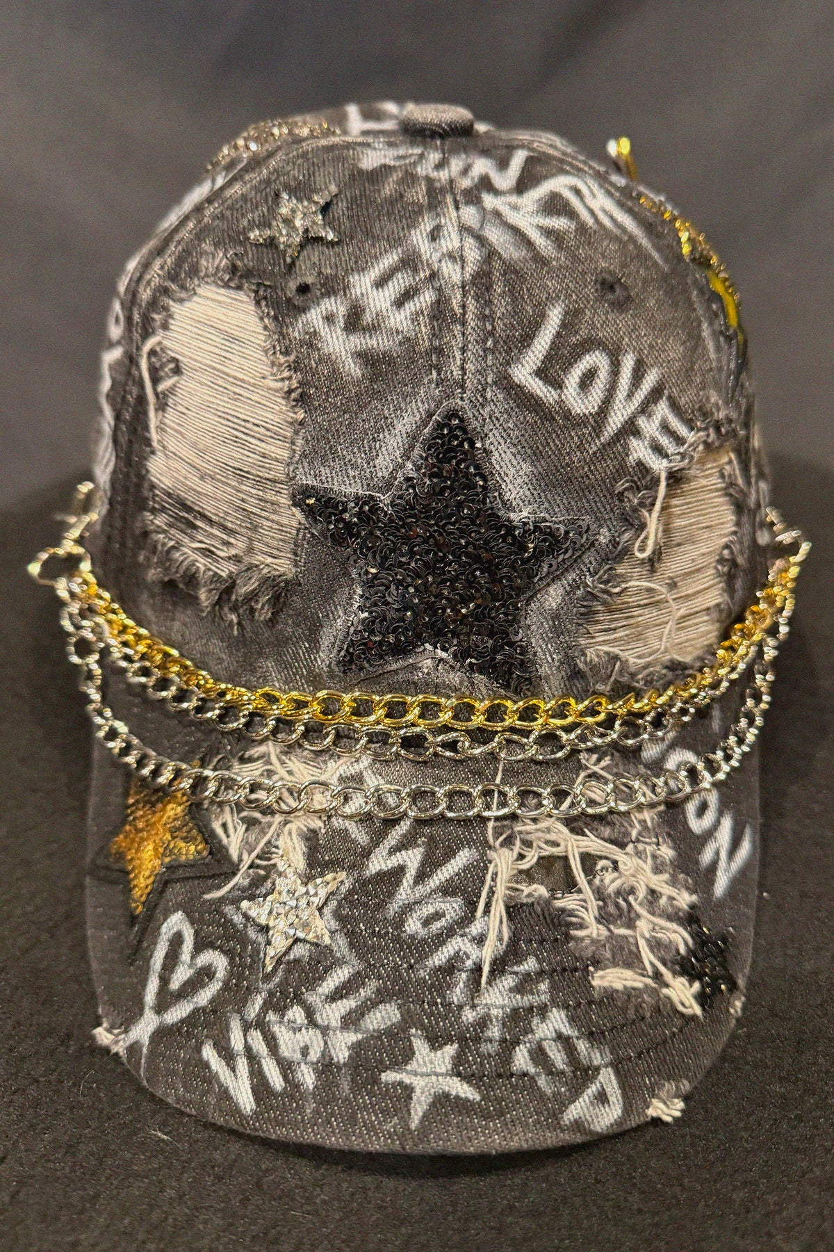 The RAW Star Black Denim Cap front view — Skinner & Vale upcycled denim jacket