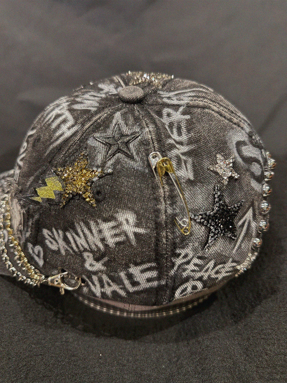 The RAW Star Black Denim Cap front view — Skinner & Vale upcycled denim jacket