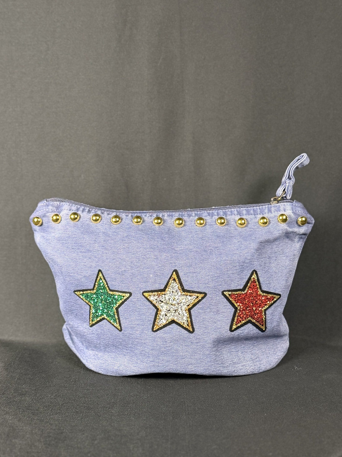 Three Little Birds Everything Bag, shown on a grey backdrop