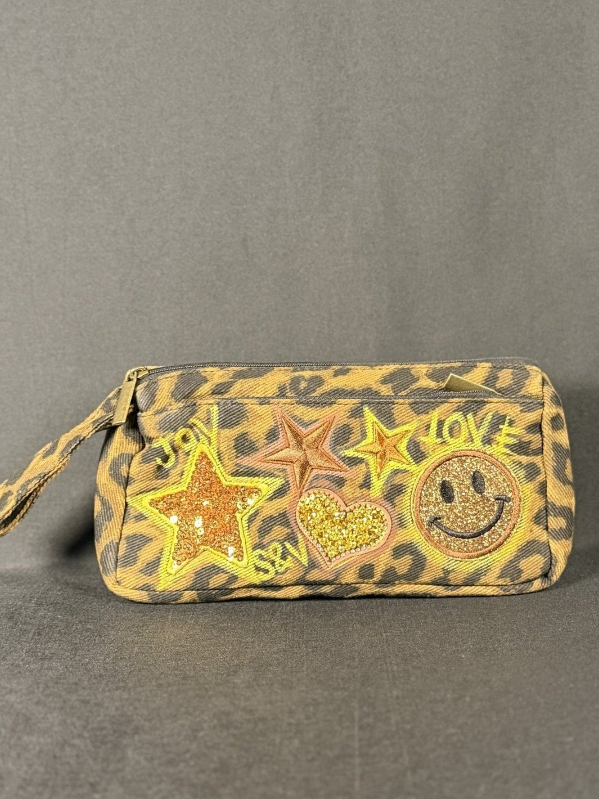 Eye of the Tiger Anything Pouch, shown on a grey backdrop
