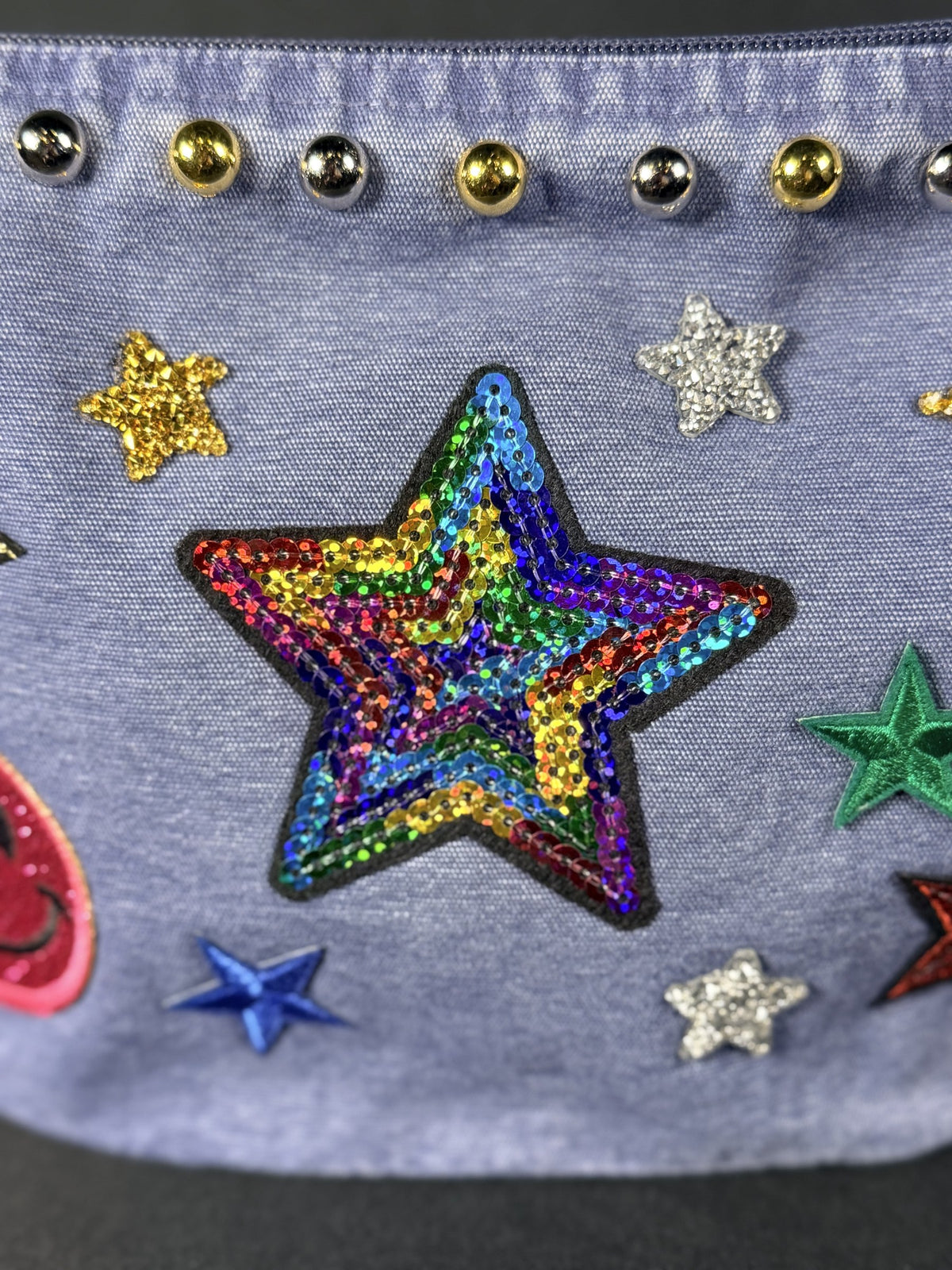 Happy Hour Everything Bag, close-up of the hand-applied patches