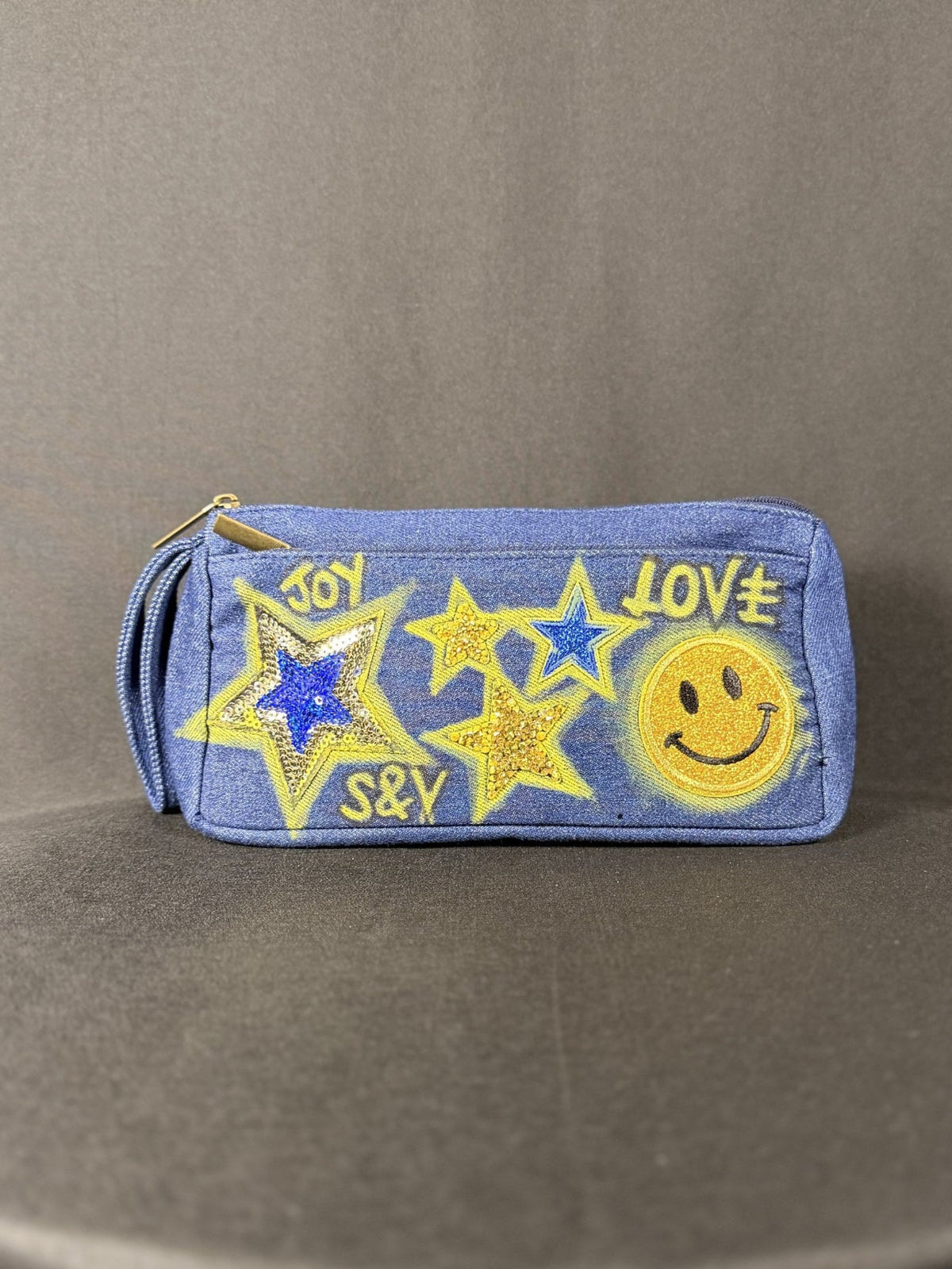 Walking on Sunshine Anything Pouch, shown on a grey backdrop