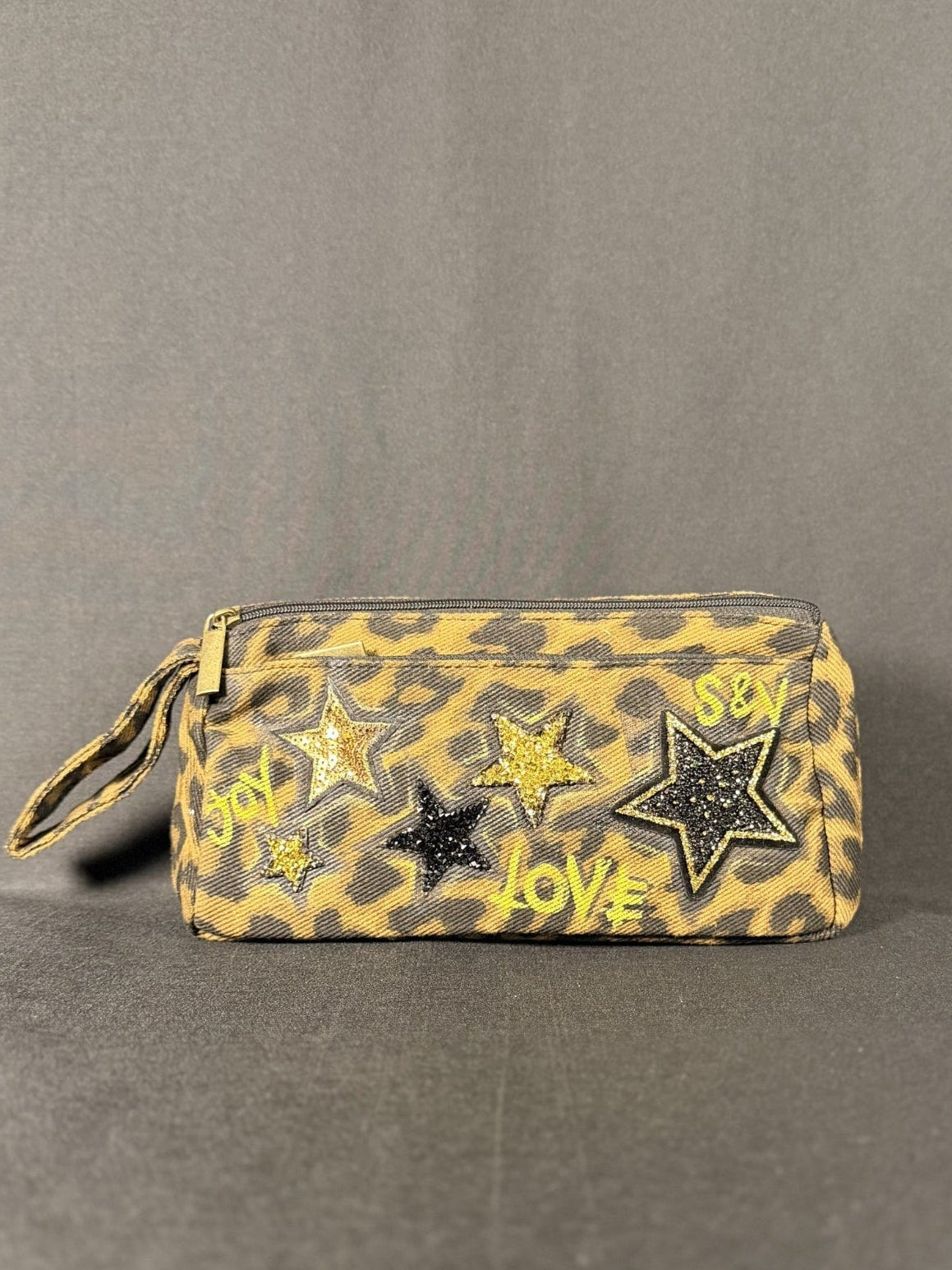 Back in Black Anything Pouch, shown on a grey backdrop